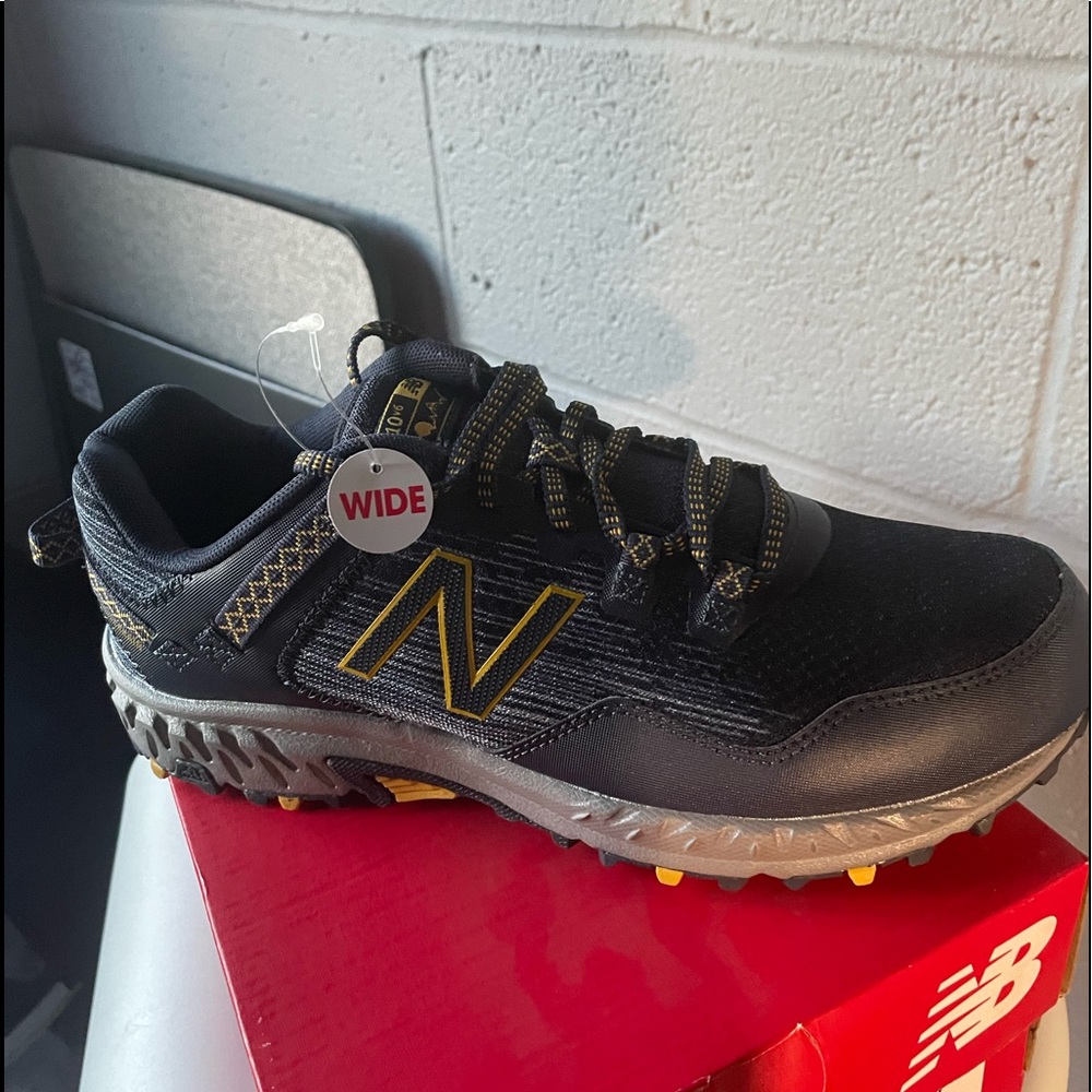 New Balance “Trail Running” sneaker. 8.5 wide.